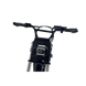 Close-up of a motorcycle handlebar with a headlight on a gray background