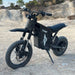 All-black freego-x0 electric mini dirt bike (for teens/adults) with rugged tires, front suspension, and "Freego" branding, positioned on gravel terrain.